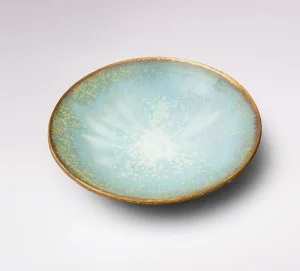 handmade ceramic plate, crafted in France by artisan Karen Swami, featuring a unique constellation glaze, luxury piece of French pottery, perfect for home decor ation