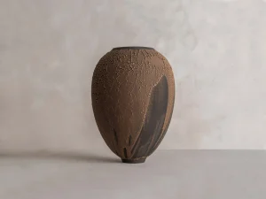 handcrafted ceramic vase, shows a raw Galuchat texture, earthy brown tones, a unique French artisan piece, combining hand-thrown pottery traditions with contemporary ceramic art, luxury gift, handmade in Paris