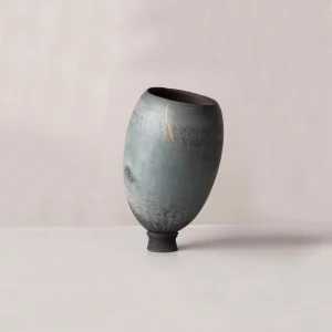 artisan ceramic vase, handmade in France, features a kintsugi detail, soft smoky blue hues, unique piece of French ceramic art, ideal for luxury ceramic collector, handcrafted, French pottery
