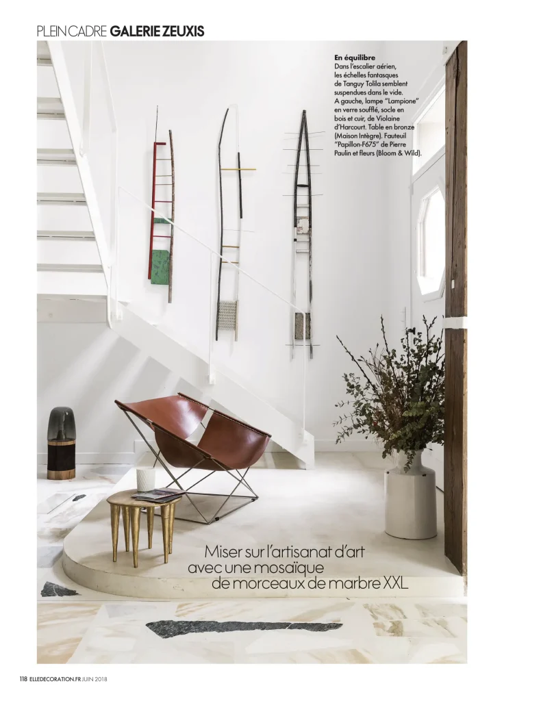 press contemporary ceramics, parisian creation by ceramist karen swami, exhibited in a minimalist interior design setting, highlighting pure aesthetics and the french art de vivre with handmade stoneware pieces